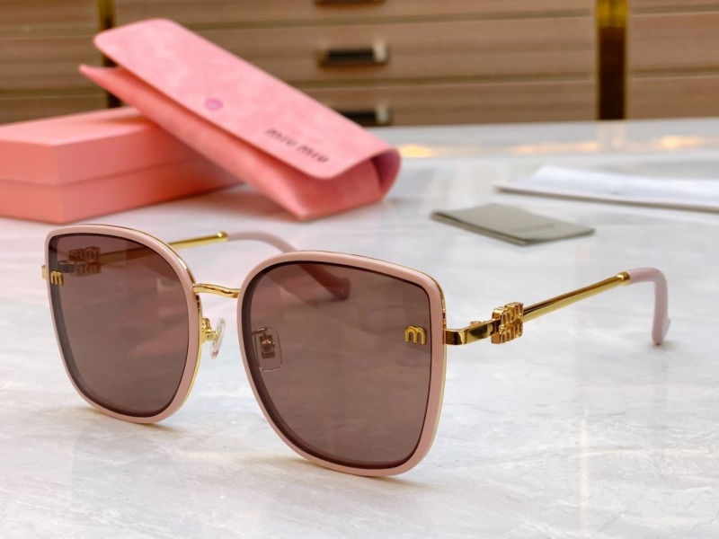 Miu miu Sunglasses